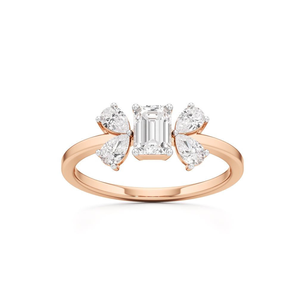 Elegant EmeraldCut Pear Diamond Accent Ring