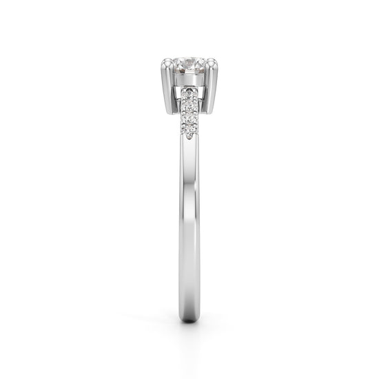 Vistara shared prong round cut side stone ring